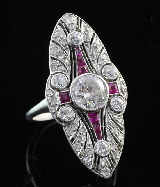 A 1930s/1940s platinum, ruby and diamond set up finger ring, size O.